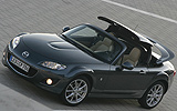 Mazda MX-5. Roadster Coup&eacute;. Modelo 2009. Imagen exterior. Frontal lateral. Carretera. Gris.