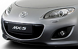 Mazda MX-5. Soft Top. Modelo 2009. Imagen exterior. Detalle frontal. Coche parado. Estudio. Gris