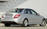 Mercedes-Benz Clase C BlueEFFICIENCY. Modelo 2009. Imagen. Posterior- lateral. Coche parado. Carretera. Gris.