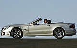 Mercedes-Benz SL 65 AMG. Modelo 2008. Imagen. Lateral. Coche parado. Descapotado. Carretera. Llantas aleaci�n AMG 19 pulgadas y radios dobles. Plata iridio.