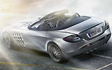 Mercedes-Benz SLR McLaren Roadster 722 S. Modelo 2009. Imagen. Lateral- posterior. Coche parado. Carretera. Gris.