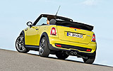 MINI Cabrio. Modelo 2009. Imagen. Exterior. Coche parado. Posterior lateral. Amarillo.