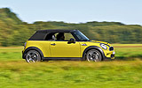 MINI Cabrio. Modelo 2009. Imagen. Exterior. Movimiento. Lateral. Amarillo