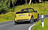 MINI Cabrio. Modelo 2009. Imagen. Exterior. Movimiento. Posterior lateral. Amarillo