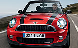 MINI John Cooper Works Cabrio. Modelo 2009. Imagen. Exterior. Frontal. Movimiento. Carretera. Rojo.
