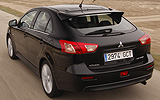 Mitsubishi Lancer Sportback. Modelo 2009. Imagen exterior. Posterior. Movimiento. Carretera. Negro