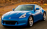 Nissan 370Z. Modelo 2009. Imagen exterior. Frontal lateral. Cocheh parado. Carretera. Azul.