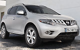 Nissan Murano. Modelo 2009. Imagen. Lateral- frontal. Coche parado. Carretera. Gris.