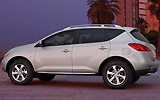 Nissan Murano. Modelo 2009. Imagen. Lateral. Coche parado. Carretera. Gris.