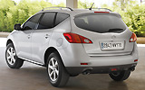 Nissan Murano. Modelo 2009. Imagen. Lateral- posterior. Coche parado. Carretera. Gris.