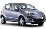 Nissan Pixo. Modelo 2009. Imagen. Exterior. Lateral frontal. Coche parado. Estudio.