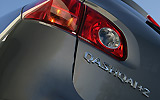 Nissan Qashqai+2. Modelo 2009. Imagen. Detalle piloto izquierdo. Gris.
