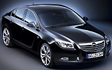 Opel Insignia. Modelo 2009. Carrocer�a 4 puertas. Imagen. Exterior. Lateral frontal. Coche parado. Estudio. Negro.