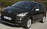 Peugeot 3008. Modelo 2009. Imagen. Exterior. Frontal lateral. Coche en movimiento. Carretera.