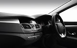 Renault Laguna Coup�. Modelo 2009. Imagen. Interior. Salpicadero. Volante en el lado derecho. Consola central. Navegador.
