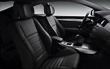 Renault Laguna Coup�. Modelo 2009. Imagen. Interior. Volante y salpicadero. Palanca de cambios manual. Asientos delanteros.