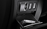 Renault Laguna Coup�. Modelo 2009. Imagen. Interior. Detalle hueco para obketos. Mando intensidad luces. 