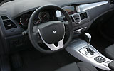 Renault Laguna Coup�. Modelo 2009. Imagen. Interior. Volante. Salpicadero. Consola central. Navegador. Palanca de cambios autom�tica.