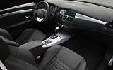Renault Laguna Coup�. Modelo 2009. Imagen. Interior. Volante. Salpicadero. Consola central. Radio CD. Navegador. Palanca de cambios autom�tica.