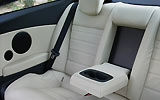 Renault Laguna Coup�. Modelo 2009. Imagen. Interior. Asientos traseros con sujetavasos.