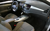 Renault Laguna Coup�. Modelo 2009. Imagen. Interior. Salpicadero. Volante. Consola central. Cuadro de instrumentos.