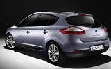 Renault Megane. Modelo 2009. Imagen. 5 puertas. Lateral posterior. Coche parado. Estudio.