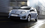 Renault Twingo RS. Modelo 2009. Imagen. Frontal- lateral. Coche en movimiento. Carretera. Dark metal grey.