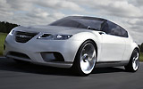 Saab 9-X Air. Prototipo 2008. Imagen. Frontal- lateral. Coche en movimiento. Carretera. Gris.