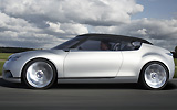 Saab 9-X Air. Prototipo 2008. Imagen. Lateral. Coche en movimiento. Carretera. Capota. Gris.