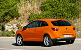 Seat Ibiza. Modelo 2008. Imagen. Carrocer�a SportCoup�. Lateral- posterior. Est�tico. Carretera. Llantas aleaci�n. 17 pulgadas. Naranja Lumina.