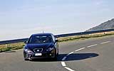 SEAT Le�n Cupra. Modelo 2008. Imagen exterior. Frontal. Movimiento. Carretera. Negro.