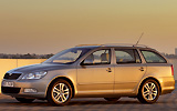 �koda Octavia. Modelo 2009. Carrocer�a Combi (familiar). Imagen. Exterior. Lateral. Parado. Carretera. Gris.