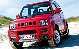 Suzuki Jimny. Modelo 2008. Imagen exterior. Frontal lateral. Parado. Carretera. Rojo.