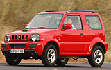 Suzuki Jimny. Modelo 2008. Imagen exterior. Lateral frontal. Movimiento. Carretera. Rojo.