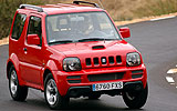 Suzuki Jimny. Modelo 2008. Imagen exterior. Frontal. Movimiento. Carretera. Rojo.