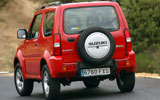 Suzuki Jimny. Modelo 2008. Imagen exterior. Posterior. Movimiento. Carretera. Rojo.