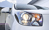 Toyota iQ. Modelo 2009. Imagen. Detalle faro derecho.