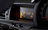 Toyota iQ. Modelo 2009. Imagen. Interior. Detalle ordenador de abordo.