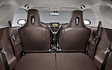 Toyota iQ. Modelo 2009. Imagen. Interior. Asientos traseros plegables.
