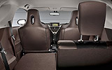 Toyota iQ. Modelo 2009. Imagen. Interior. Asiento trasero izquierdo abatible.