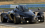 Tramontana R. Modelo 2009. Imagen. Exterior. Lateral frontal. Coche en movimiento. Carretera. Negro.