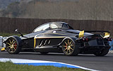 Tramontana R. Modelo 2009. Imagen. Exterior. Lateral posterior. Coche parado. Carretera. Negro.
