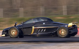 Tramontana R. Modelo 2009. Imagen. Exterior. Lateral. Coche en movimiento. Carretera. Negro.