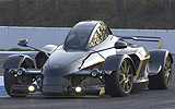 Tramontana R. Modelo 2009. Imagen. Exterior. Frontal lateral. Coche en movimiento. Carretera en curva. Negro.