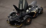 Tramontana R. Modelo 2009. Imagen. Exterior. Cenital. Coche parado. Carretera. Negro.