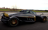 Tramontana R. Modelo 2009. Imagen. Exterior. Posterior lateral. Coche en movimiento. Carretera. Negro.