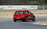 Volkswagen Golf 5p Sport 1.4 TSI 122 CV DSG 7 vel. Modelo 2009. Prueba de larga duraci�n. Imagen. Exterior. Posterior lateral. Coche en curva. Movimiento. Circuito del Jarama.