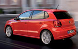 Volkswagen Polo. Modelo 2009. Imagen. Exterior. Lateral posterior. Movimiento. Carretera. Rojo.