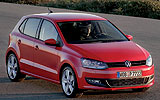 Volkswagen Polo. Modelo 2009. Imagen. Exterior. Lateral posterior. Coche. Carretera. Rojo.