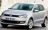Volkswagen Polo. Modelo 2009. Imagen. Exterior. Frontal lateral. Coche parado. Carretera. Gris.
